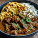 Slow-Cooked Beef and Coconut Curry with Garlic Naan